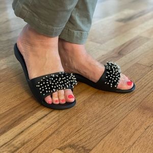 Oka Sandals. New, never worn. Medium/large which fits 8-8.5 US